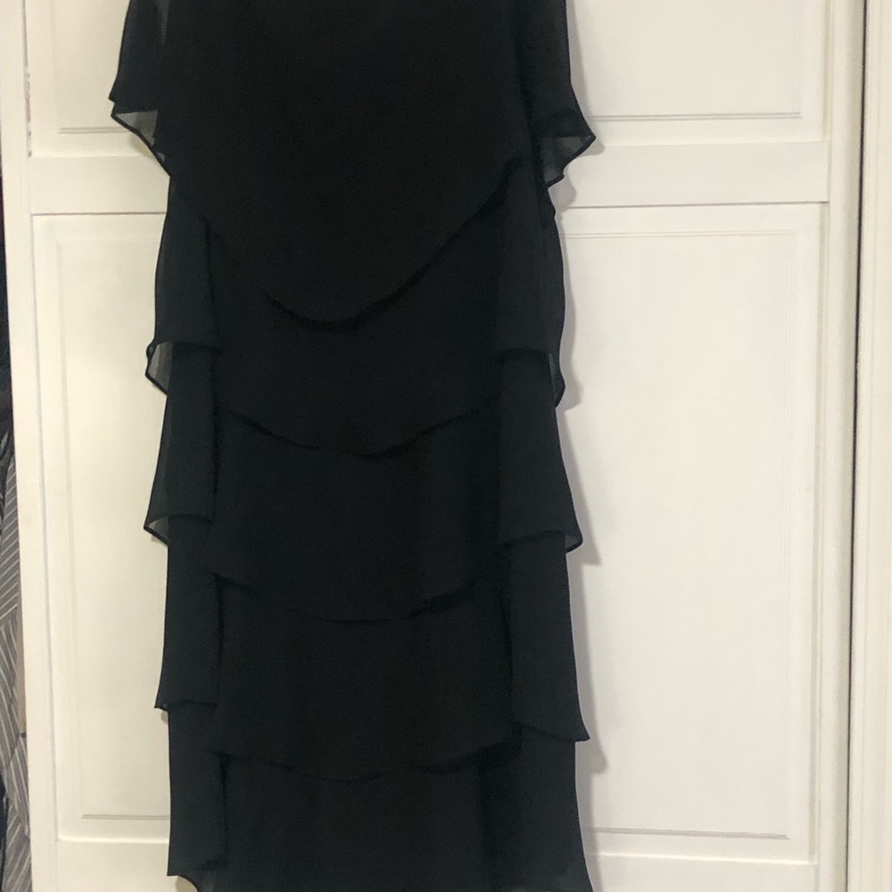 Black cocktail dress, with flutter sleeves